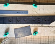 CNC'd fretboard with moon inlays and alien heads
